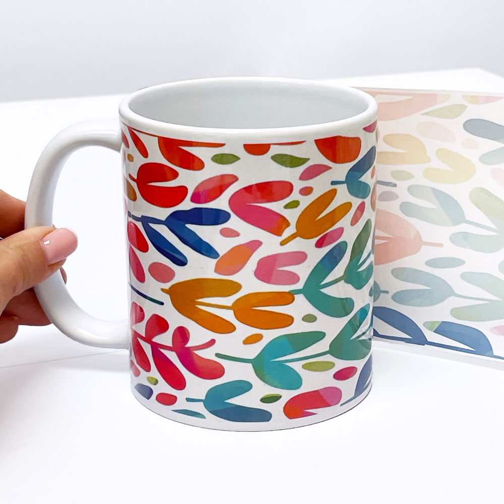 A mug being printed with Subli-Pro sublimation paper, highlighting the exceptional ink release. The image demonstrates up to 90% ink transfer, thanks to advanced coating technology that ensures bright, vivid colours and crisp details, bringing designs to life.