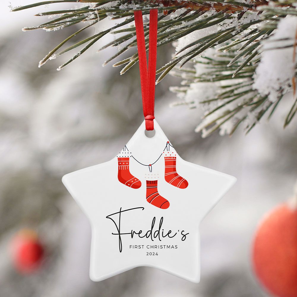 Personalised ceramic star ornament hanging on a Christmas tree, customised with sublimation printing—perfect for unique Christmas sublimation ideas.